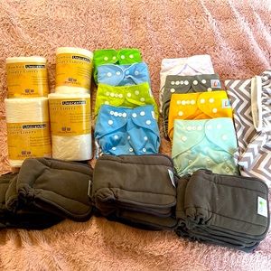 All new lot of 8 cloth diaper,4 packs of bamboo liners,12 cloth liners,1 wet bag
